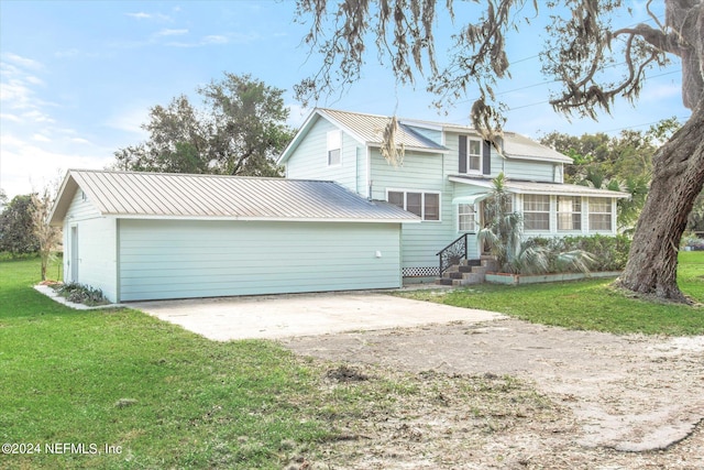 view of property featuring a front yard