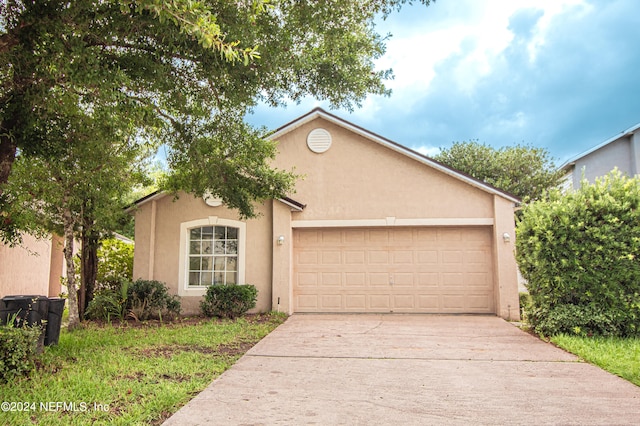 view of front of house with a garage