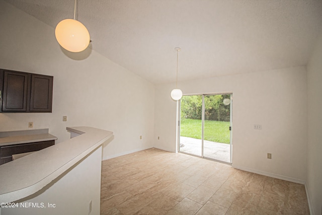 interior space featuring vaulted ceiling