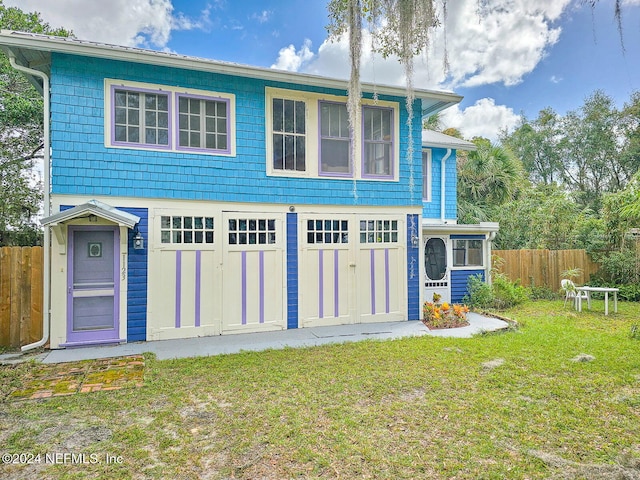 view of front of home with a front yard