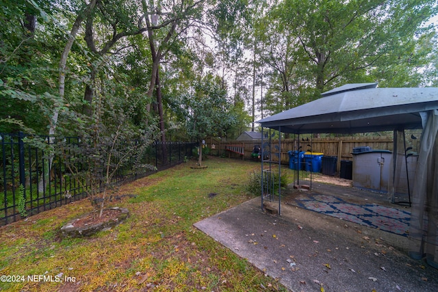 view of yard with a patio and a gazebo