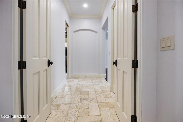 corridor featuring ornamental molding