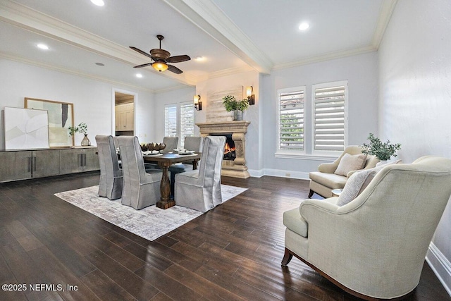 dining space featuring dark hardwood / wood-style floors, ceiling fan, and ornamental molding