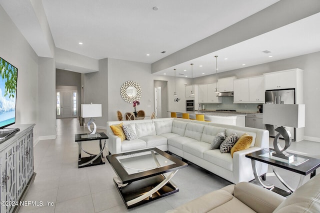145 Sugar Sand Ln, Saint Johns, FL 32259 - living room with light tile patterned floors, baseboards, recessed lighting, and a notable chandelier