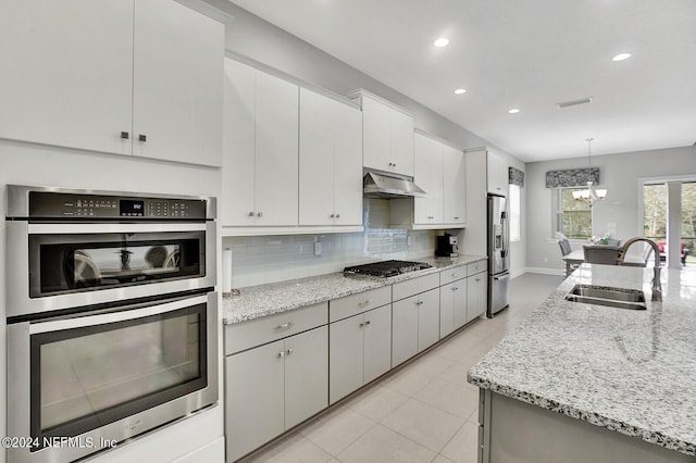 145 Sugar Sand Ln, Saint Johns, FL 32259 - kitchen featuring recessed lighting, a sink, appliances with stainless steel finishes, and backsplash