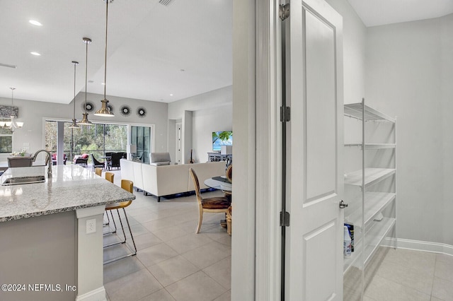 145 Sugar Sand Ln, Saint Johns, FL 32259 - interior space featuring recessed lighting, a sink, and light tile patterned floors
