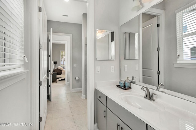 bathroom with vanity and tile patterned flooring