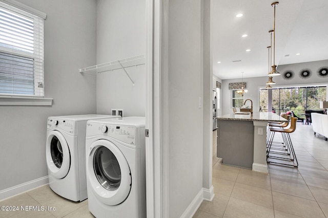 145 Sugar Sand Ln, Saint Johns, FL 32259 - laundry room with laundry area, baseboards, recessed lighting, separate washer and dryer, and a sink