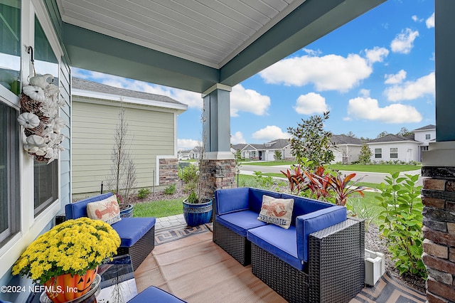 wooden deck featuring covered porch