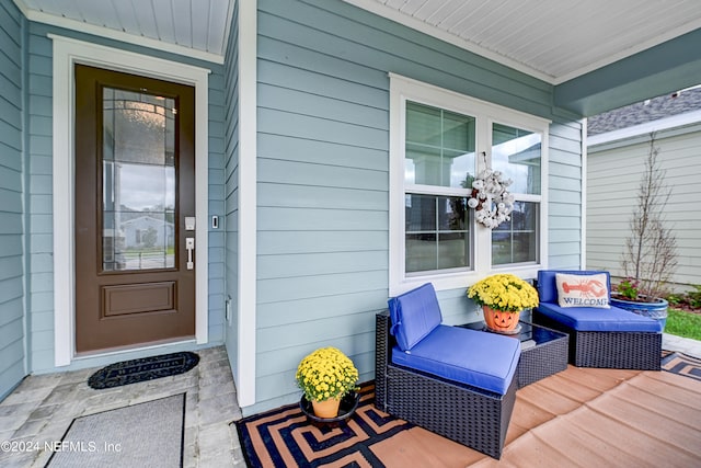 property entrance featuring covered porch