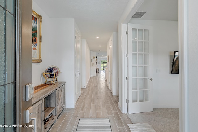 hall featuring light hardwood / wood-style floors