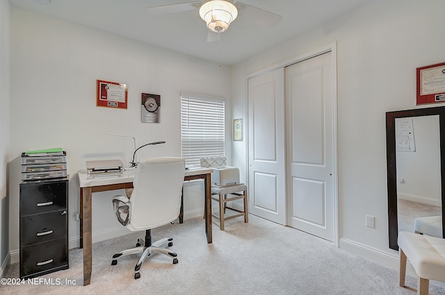 office area with light carpet and ceiling fan