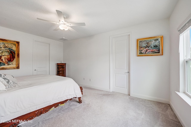 bedroom featuring ceiling fan and carpet flooring