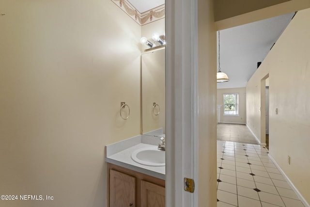 bathroom featuring vanity and tile patterned flooring