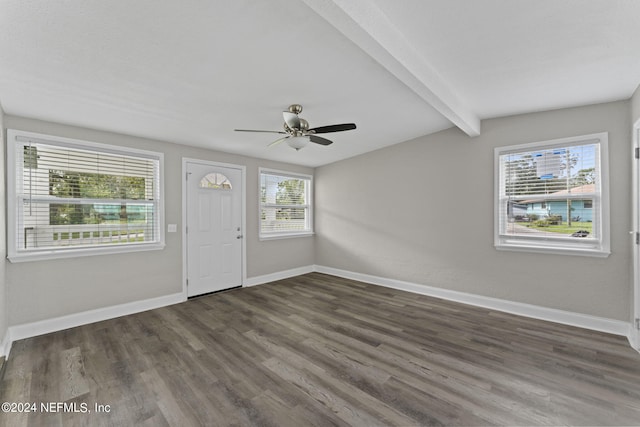 entryway with beam ceiling, dark wood-type flooring, and ceiling fan