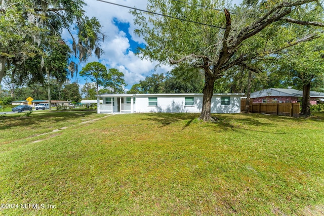 exterior space featuring a front lawn