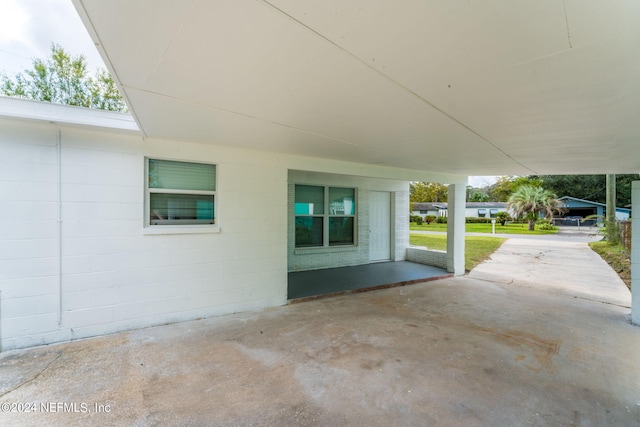 view of patio featuring a carport