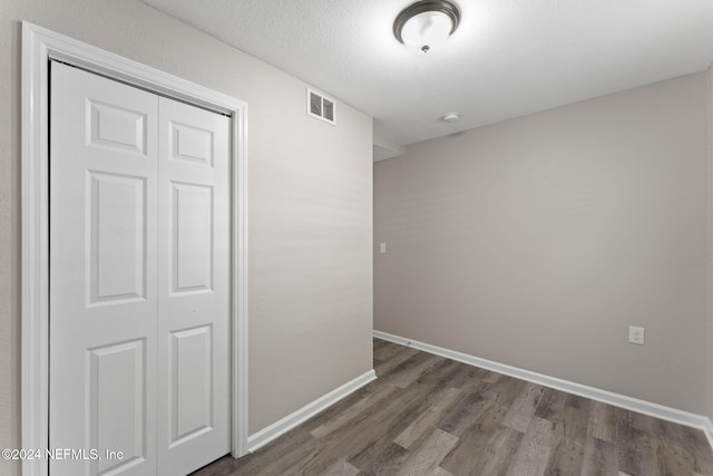 interior space with dark hardwood / wood-style flooring