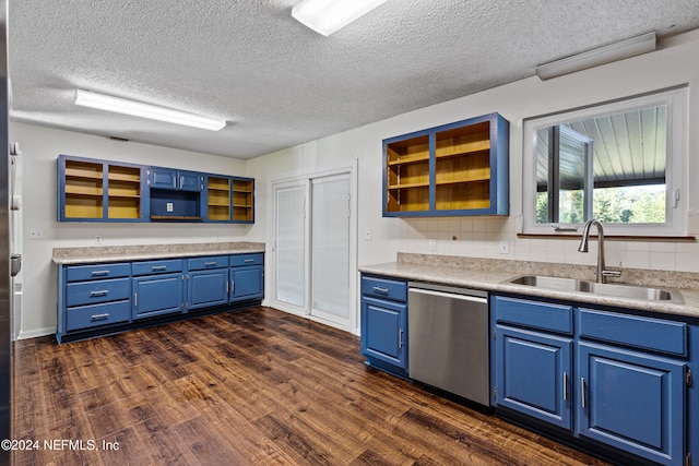 kitchen featuring dark hardwood / wood-style floors, sink, stainless steel dishwasher, blue cabinets, and a textured ceiling