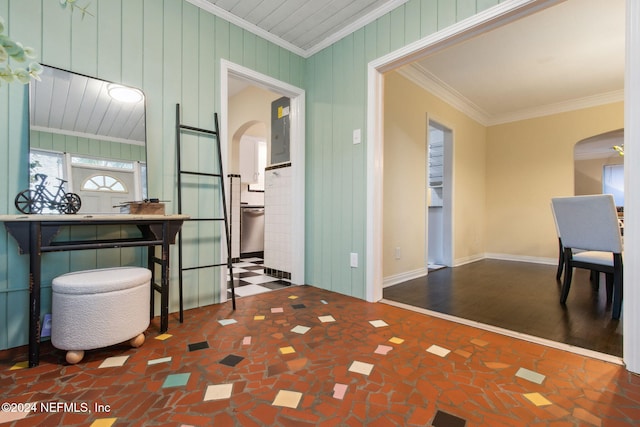 interior space featuring crown molding and hardwood / wood-style floors