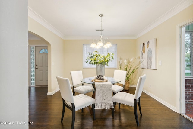 dining space with crown molding, an inviting chandelier, and dark hardwood / wood-style flooring