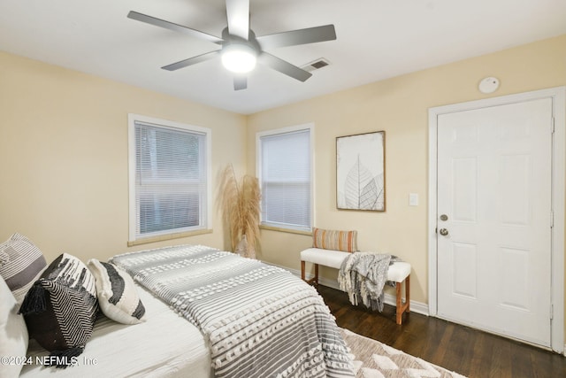 bedroom featuring dark hardwood / wood-style flooring and ceiling fan