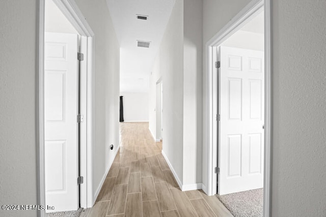 hall featuring light wood-type flooring