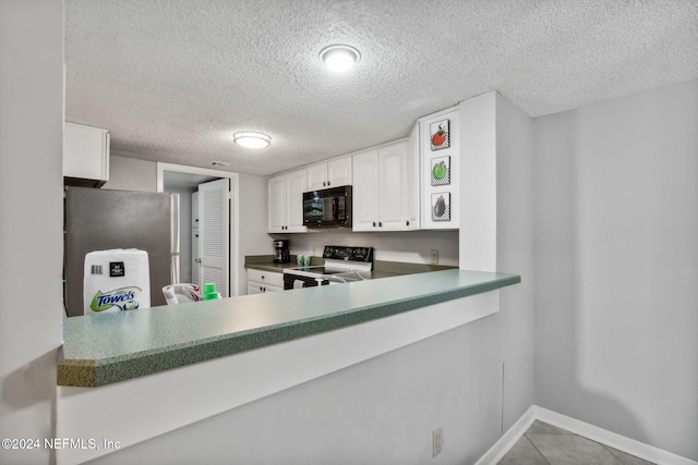 kitchen featuring stainless steel fridge, electric range, white cabinetry, a textured ceiling, and tile patterned flooring