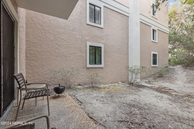 view of home's exterior with a patio