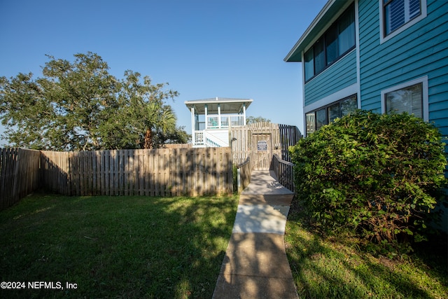 view of yard with a fenced backyard