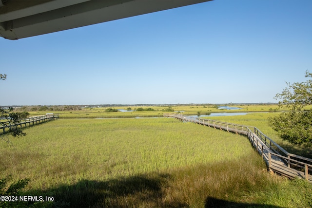 exterior space featuring a water view and a rural view