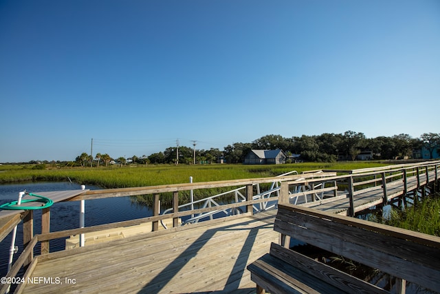 view of dock with a water view