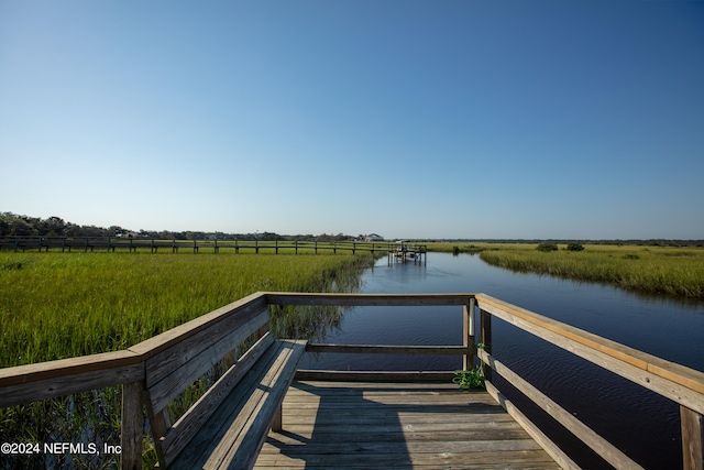 dock area featuring a water view