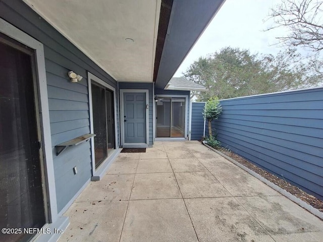 view of patio / terrace with fence