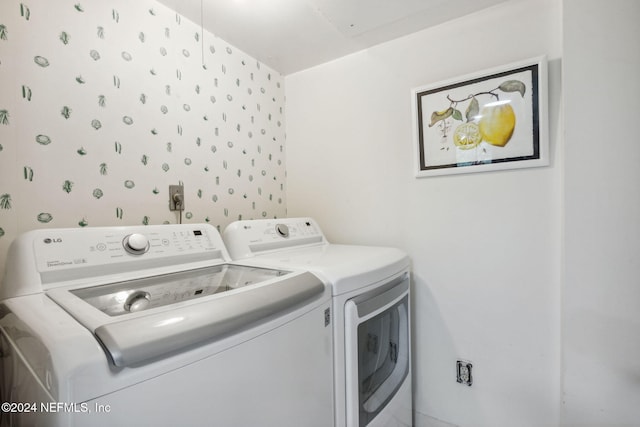 laundry room with washer and dryer