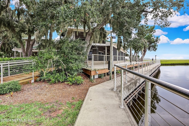 dock area with a water view