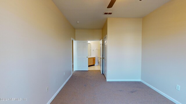 7990 Baymeadows Rd E Unit 410, Jacksonville, FL 32256 - carpeted spare room featuring ceiling fan and baseboards