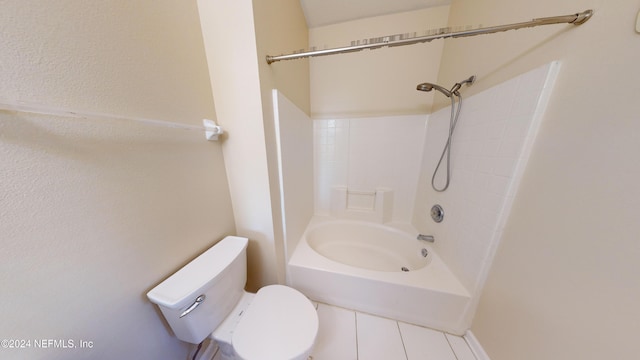 bathroom with bathtub / shower combination, toilet, and tile patterned flooring