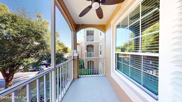 balcony featuring ceiling fan