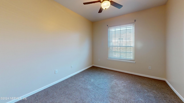 carpeted empty room with ceiling fan