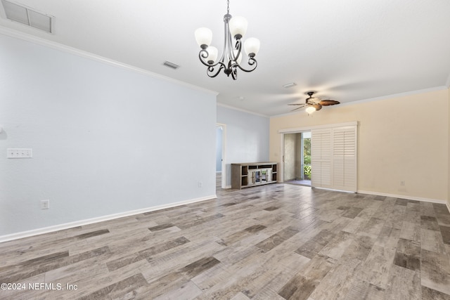 unfurnished living room with ornamental molding, light hardwood / wood-style flooring, and ceiling fan with notable chandelier