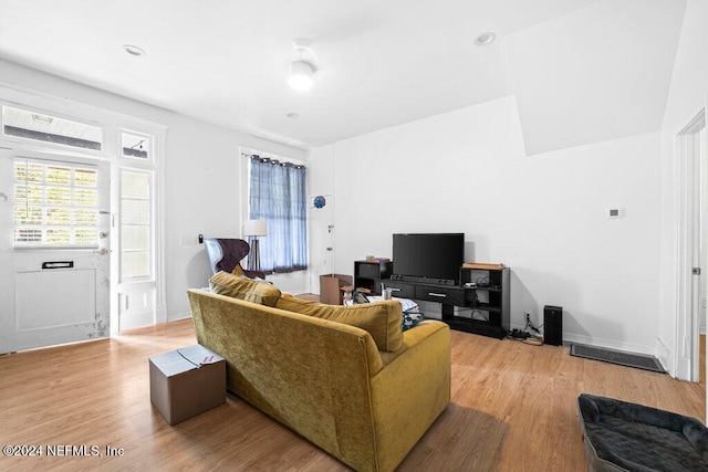 living room with light hardwood / wood-style flooring