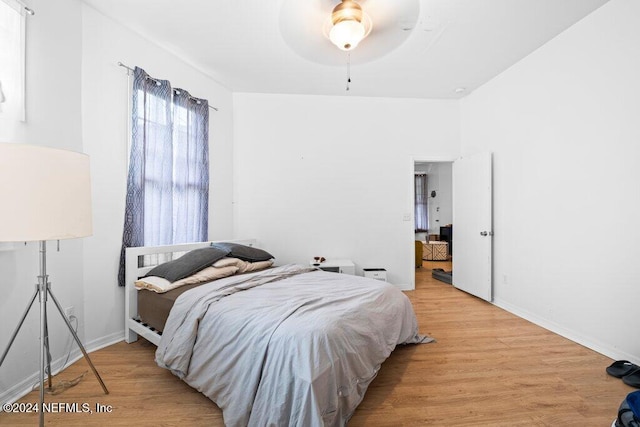 bedroom featuring ceiling fan and light wood-type flooring