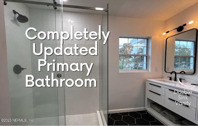 bathroom featuring vanity, walk in shower, and tile patterned flooring