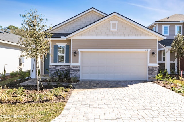 craftsman house with a garage