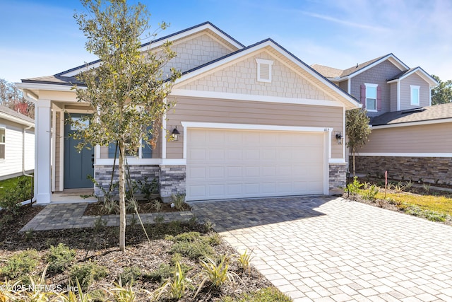 craftsman-style home with a garage