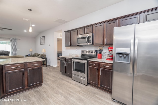 kitchen with lofted ceiling, dark brown cabinets, pendant lighting, light wood-type flooring, and appliances with stainless steel finishes