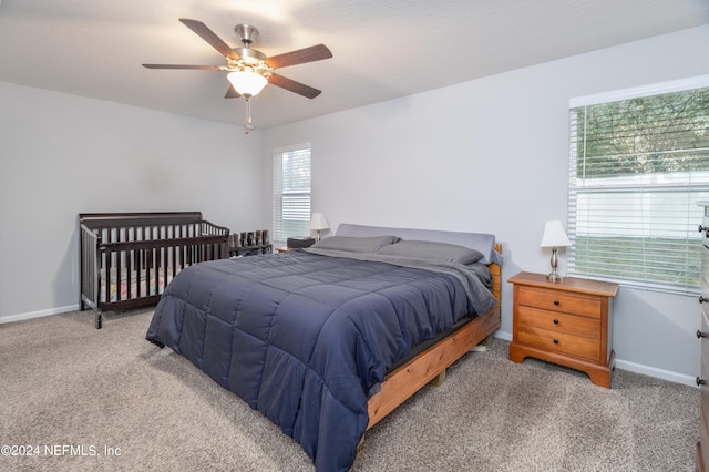 bedroom featuring carpet floors and ceiling fan