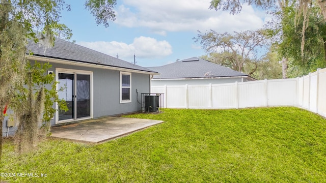 view of yard featuring a patio and cooling unit