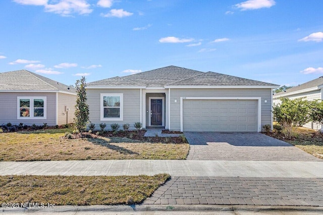 view of front of house with a garage